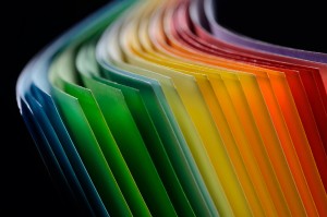 Gill's Printing - Rainbow of colored paper pages landing page